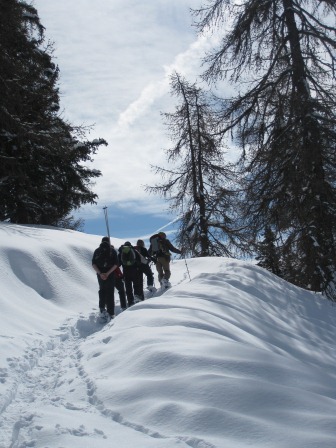 Snow shoeing in Italy on a beautiful sunny day